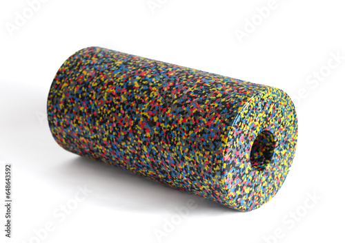 A massage foam roller isolated on a white background. Close-up. Foam rolling is a self myofascial release technique. Concept of fitness equipment.