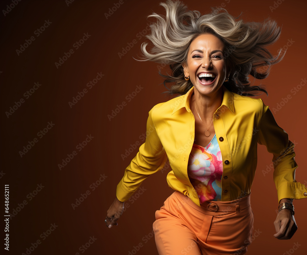 Middle aged woman cheering happily, leadership, boss, president, senior model, fashion concept. Middle aged woman cheering happily, leadership, boss, president, senior model, fashion concept.