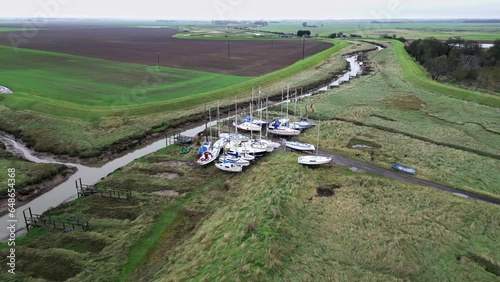 Aerial footage of boats moored inland at Gibraltar Point near Skegness