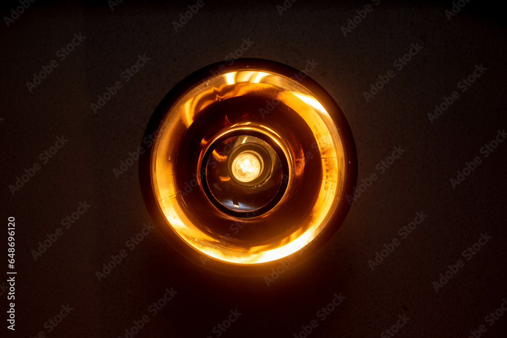 Fondo de una lampara o luz incandescente calida Fondo de una lampara o luz incandescente calida