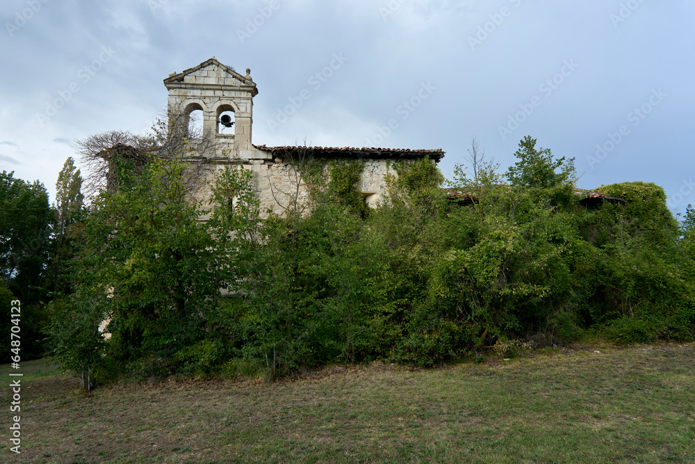 Naklejka premium aandoned hermitage without a bell and with vegetation