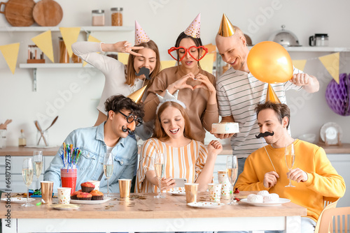 Group of young friends taki...