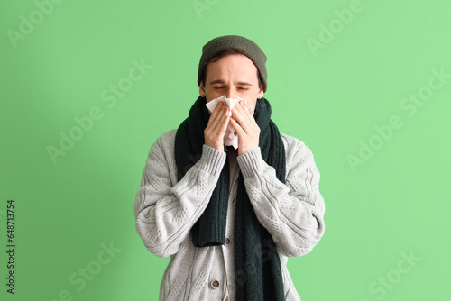Ill young man with tissue o...