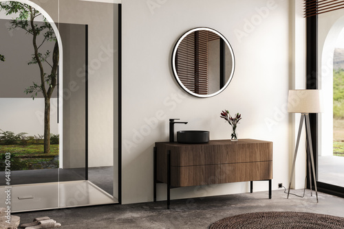 Modern bathroom interior with white walls, black sink with oval mirror, bathtub, grey concrete floor. Minimalist bright bathroom with modern furniture