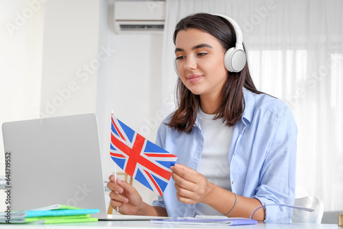 Young woman in headphones w...