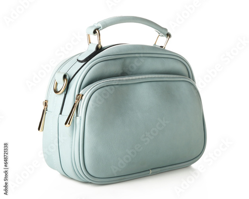 Stylish blue handbag on whi...