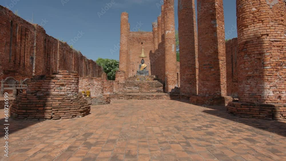 Ruins of main red brick temple with sitting buddha in historical land of ancient Ayutthaya Kingdom, interesting and unforgetable experience, World Heritage concept