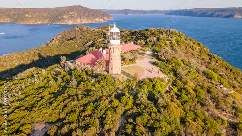 Photography Aerial drone view of Barrenjoey Head Lighthouse at Barrenjoey Headland, Palm Bea