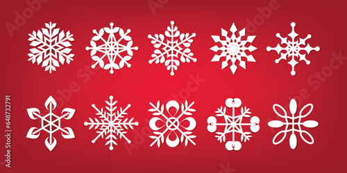 White snowflakes set on red background
