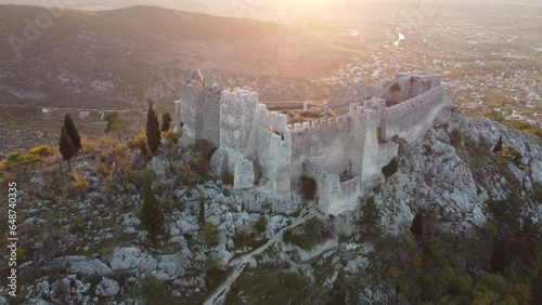 Drone flight above the walls of an old medieval Ljubushki Fortress Herceg Stjepan , Europe, Bosnia and Herzegovina photo