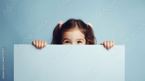 child holding a blank sign