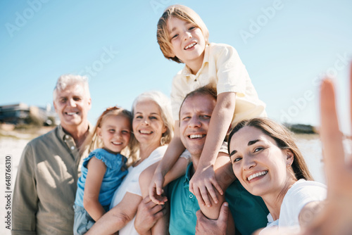 Family, grandparents and children in beach selfie, smile or bonding for love, sunshine or memory on vacation. Men, women and kids by sea, portrait or happy with social media post for summer in Spain