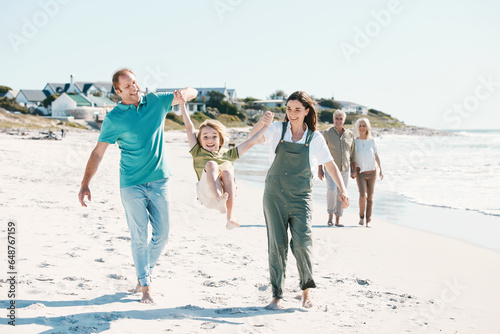 Walking, adventure and family generations on a beach together on vacation, holiday or weekend trip. Happy, travel and child with parents and grandparents bonding by ocean or sea in Australia.
