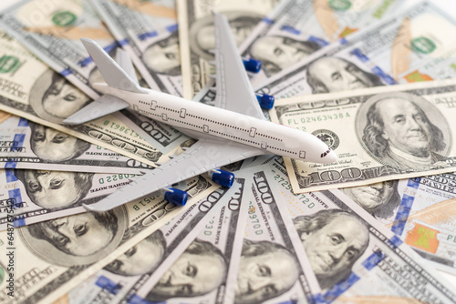 airplane on dollar bills close up