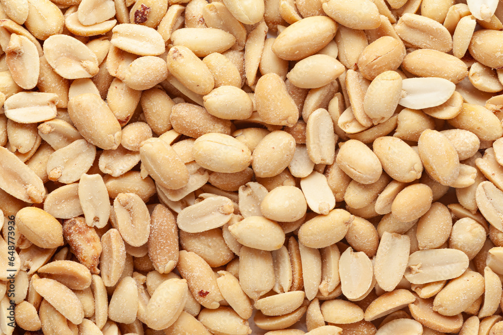 Crunchy roasted Peanuts, Indian namkeen (snacks) full-frame wallpaper. Top view. Crunchy roasted Peanuts, Indian namkeen (snacks) full-frame wallpaper. Top view.