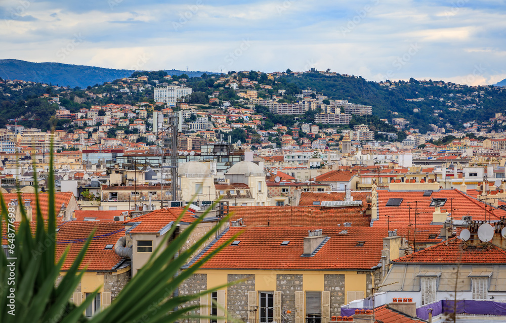 Aerial view of the bourgeois buildings and terracotta rooftops of the Carre d'Or Golden Square chic seafront district in Nice, South of France