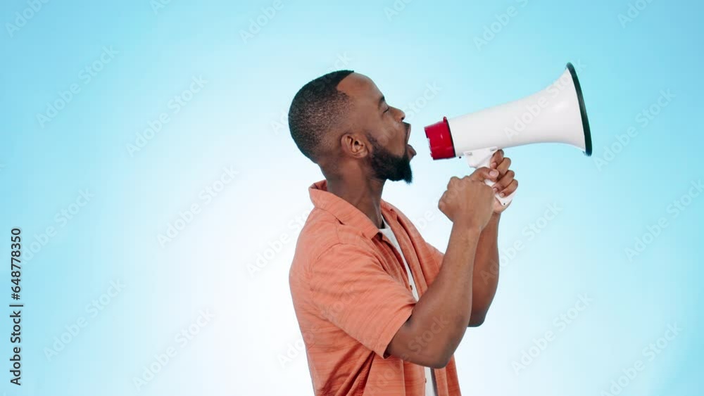 Black man with megaphone at protest and fight, politics with human rights and profile on blue background. Communication, equality and movement, empowerment and activism with call for action in studio Black man with megaphone at protest and fight, politics with human rights and profile on blue background. Communication, equality and movement, empowerment and activism with call for action in studio