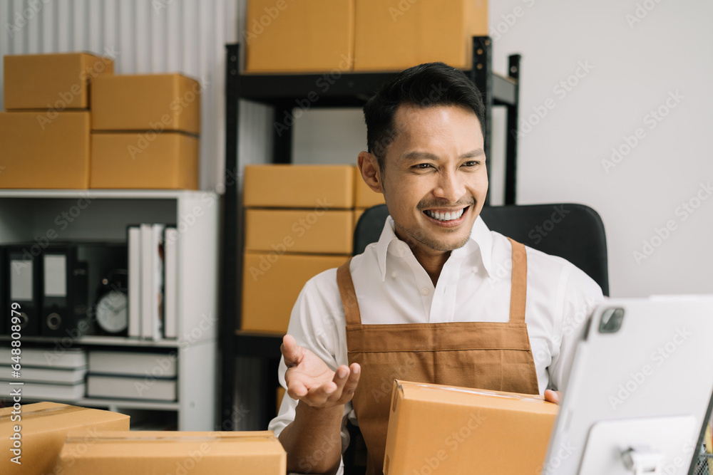 Portrait of a Small Business Startup, SME Owner, Female Entrepreneur work and check orders online. Online SME business idea. Portrait of a Small Business Startup, SME Owner, Female Entrepreneur work and check orders online. Online SME business idea.