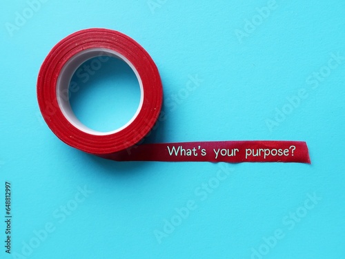 фотографія Red tape on copy space blue background with handwritten text - What’s your purpo