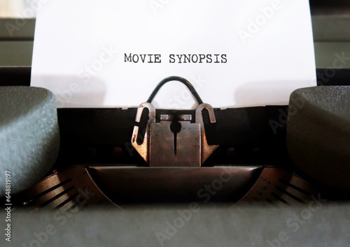 Vintage typewriter with text typed MOVIE SYNOPSIS, summary of film storyline, brief summary of a completed core concept and essential marketing tool to sell a screenplay