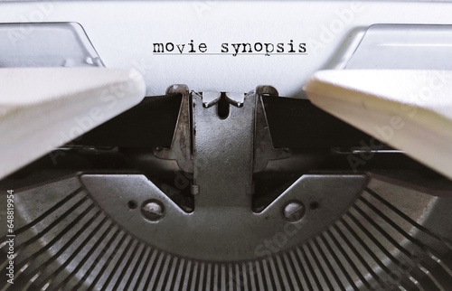 Vintage typewriter with text typed MOVIE SYNOPSIS, summarizes the film storyline,  brief summary of a completed core concept and essential marketing tool to sell a screenplay