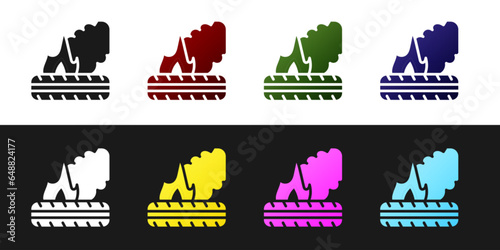 Set Lying burning tires icon isolated on black and white background. Vector
