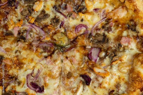 close-up of fresh and hot pizza using many ingredients