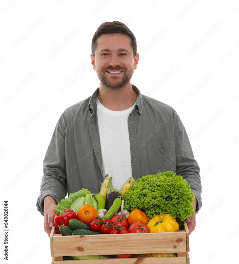 Harvesting season. Happy farmer holding wooden crate with vegetables on white background Harvesting season. Happy farmer holding wooden crate with vegetables on white background