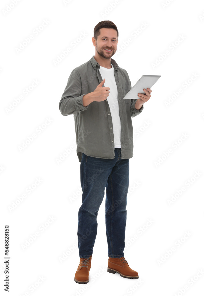 Happy man with tablet showing thumb up on white background Happy man with tablet showing thumb up on white background
