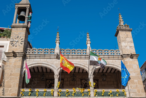 Parte alta de la fachada del ayuntamiento de la villa de Plasencia, España, con campanario y autómata llamado Abuelo Mayorga photo