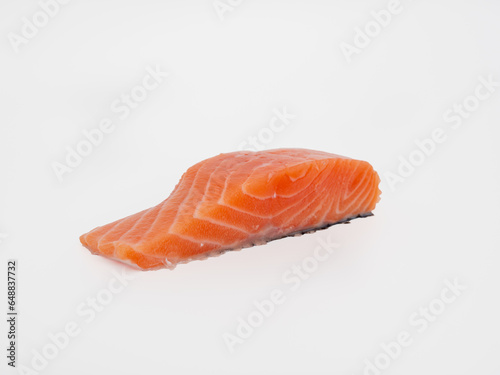 Salmon fish fillet on a white background. Red fish fillet close-up.