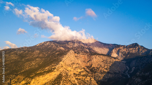 Mount Babadag covered by clouds at sunset in Oludeniz Fethiye Turkey