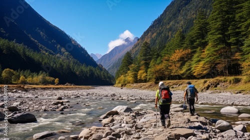 Moo area of assorted couple trekking in sunny wild strolling along rough riverbed camping occasions enterprise nature climbing and solid open air way of life