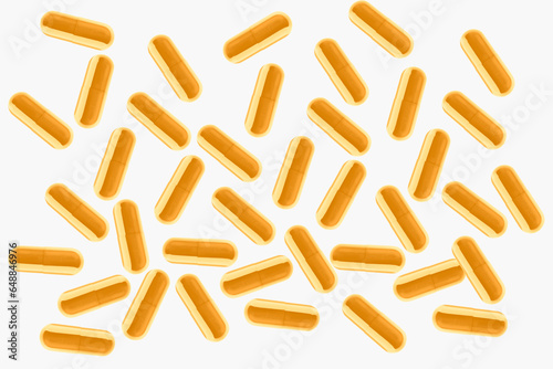 Yellow pills and tablets. On a light background.