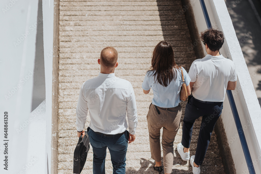 Young businesspeople walking outside Young businesspeople walking outside