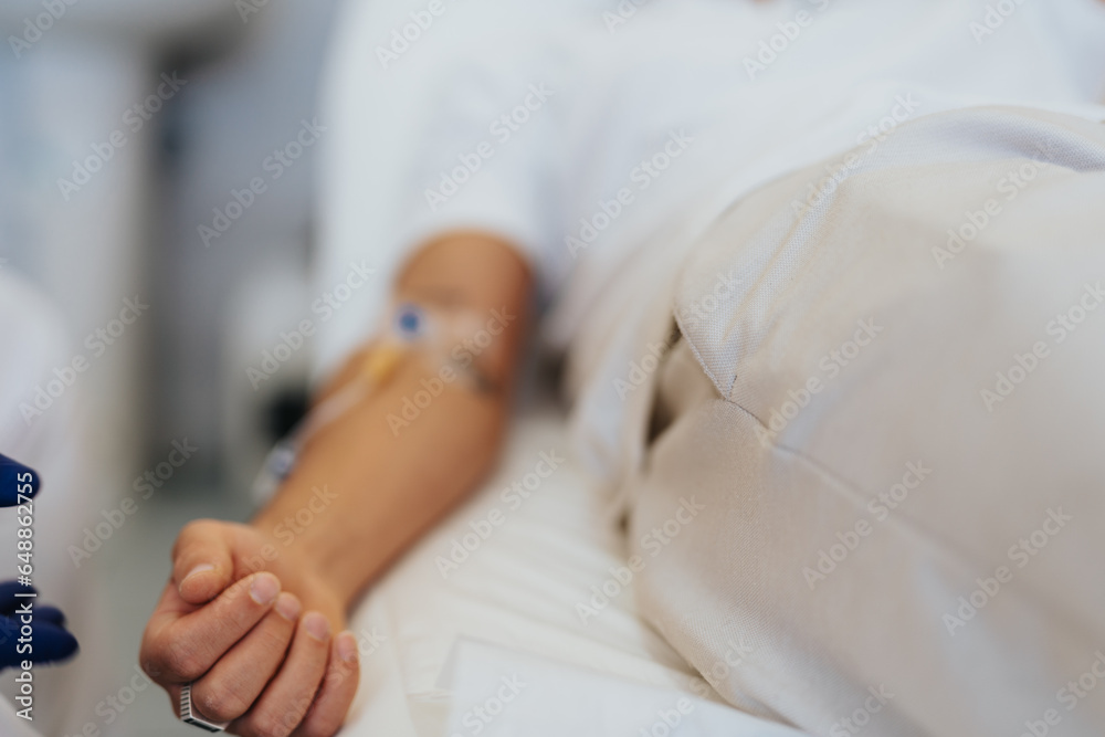 Experienced Doctor Conducting a Health Check in a Hospital Room Experienced Doctor Conducting a Health Check in a Hospital Room