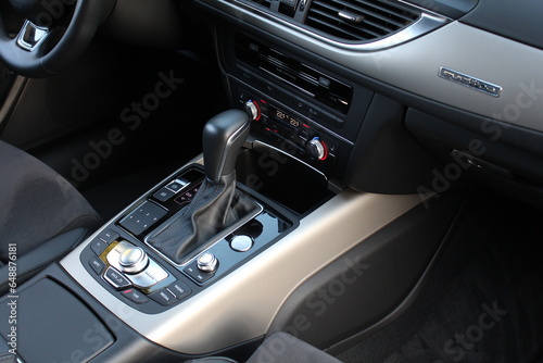 Automatic transmission gearshift stick, Closeup a manual shift of modern car gear shifter. Close up of the automatic gearbox lever, black interior car. © Best Auto Photo