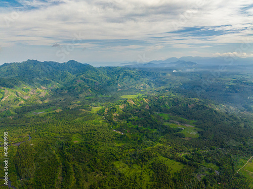 Topical landscape with rainforest. Blue sky and clouds. Mindanao, Philippines.