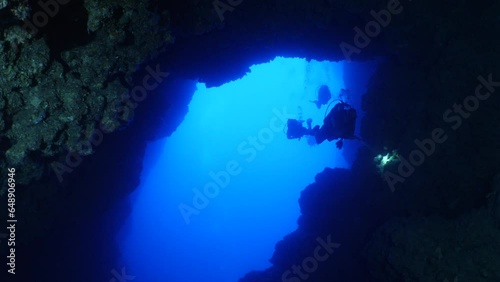 Wallpaper Mural underwater in cave beautiful light scenery in ocean scuba divers to see in cave backgrounds Torontodigital.ca