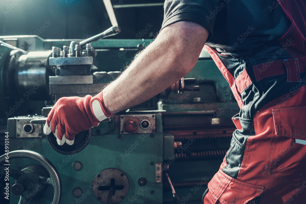 Caucasian Metalworking Worker Operating Lathe Machine