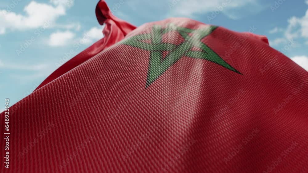 Wavy flag of Morocco blowing in the wind in slow motion. Waving ...