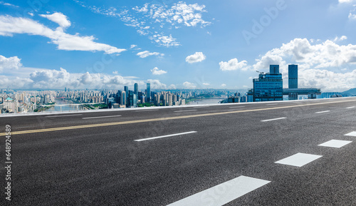 Asphalt highway road and urban skyline in Chongqing, Sichuan Province, China.