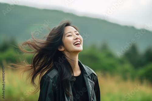 Happiness Asian Woman In Black Coat On Nature Landscape Background. Сoncept Asian Happiness, Women In Black, Nature Landscape, Coats
