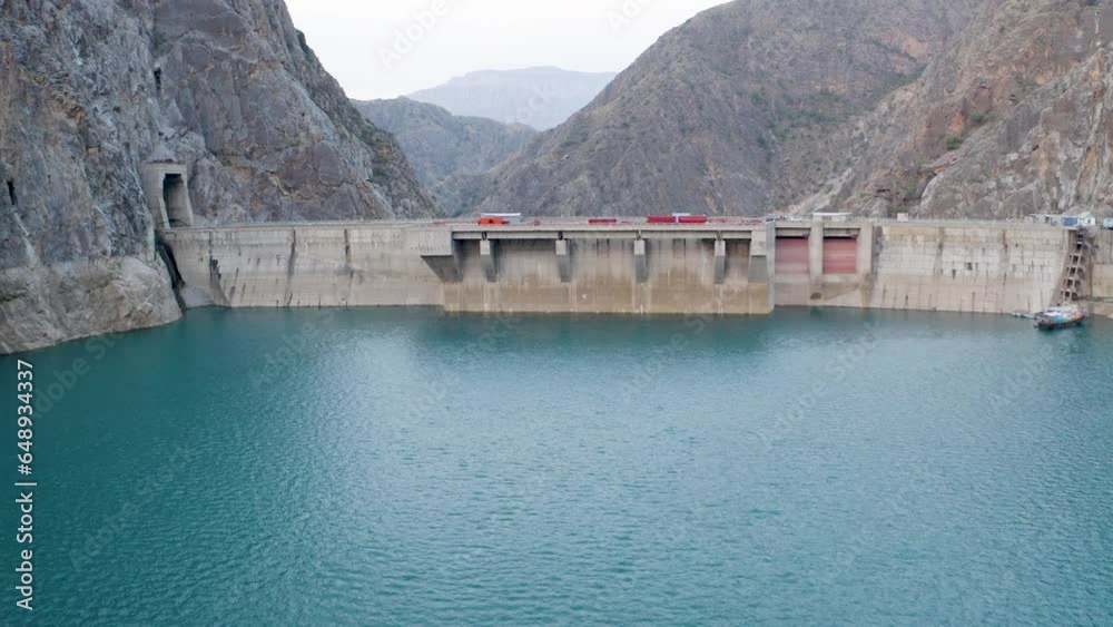 Hydroelectric power station surrounded with mountains Hydroelectric power station surrounded with mountains