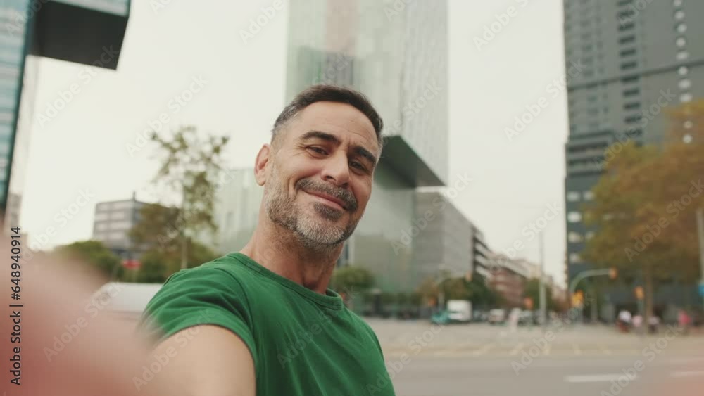 Middle aged man taking selfie on mobile phone Middle aged man taking selfie on mobile phone