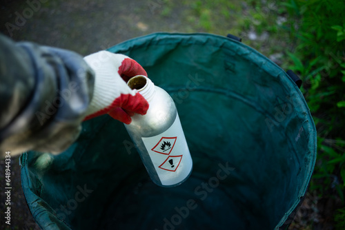 Disposal of hazardous fire hazardous waste. Aluminum bottle from flammable liquid. Discard empty containers from harmful production.