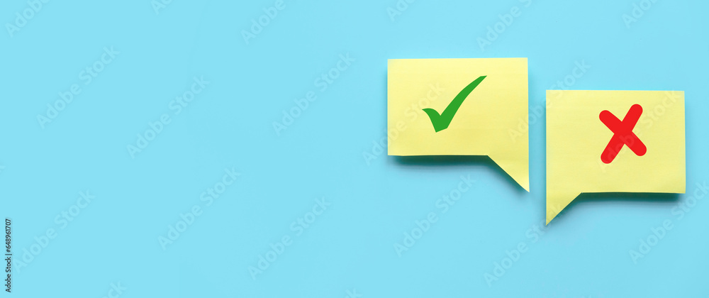 Concept of evaluation. True or false symbol. Accepted or rejected. Yes or no icon over a yellow bubble chat on blue background with copy space. Concept of evaluation. True or false symbol. Accepted or rejected. Yes or no icon over a yellow bubble chat on blue background with copy space.