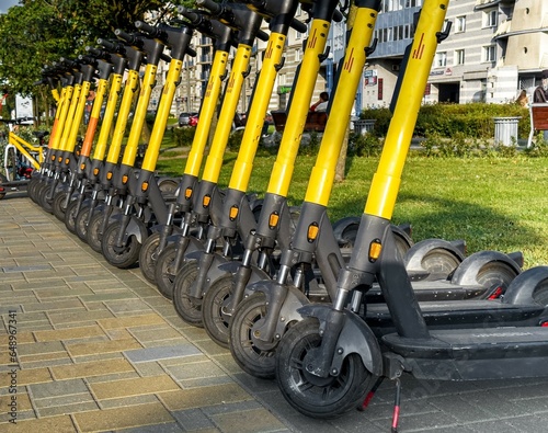 Rental kick scooters on city street