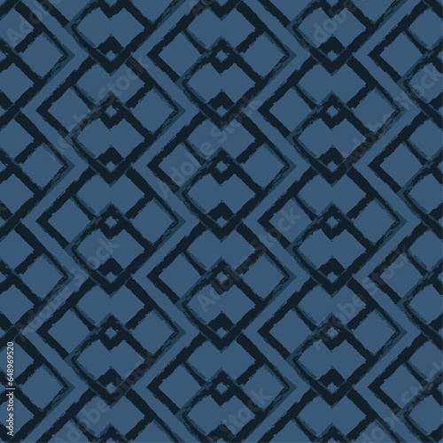 Abstract. Geometry seamless pattern. Ikat brush style indigo and white background. Vector.