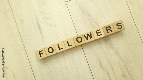 Followers text from wooden blocks. Social media, business concept
